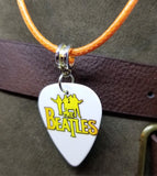 The Beatles Guitar Pick Necklace on an Orange Rolled Cord