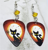 Black Cat and Flying Bats in Front of a Full Moon Guitar Pick Earrings with Yellow Swarovski Crystals