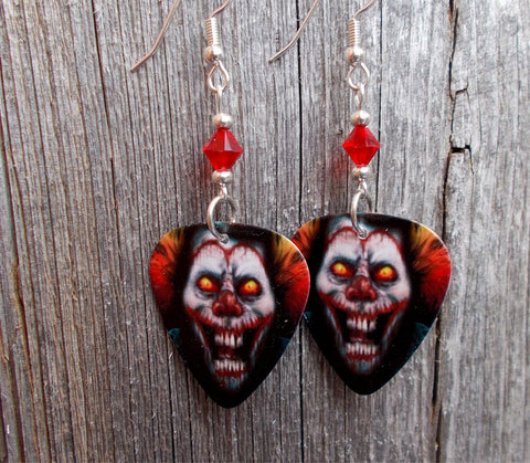 Evil Clown with Glowing Eyes Guitar Pick Earrings with Red Swarovski Crystals
