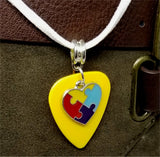 Autism Awareness Heart Charm on Yellow Guitar Pick Necklace on White Suede Cord