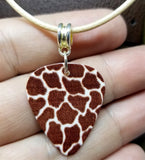 Giraffe Print Guitar Pick Necklace on Tan Rolled Cord