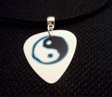 Yin and Yang White Guitar Pick Necklace on Black Suede Cord