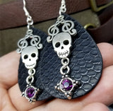 Patterned Faux Leather Teardrop Shaped Earrings with a Skull and Clef Note Charm and Crystal Charms