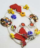 Magnesite Butterflies and Flower Beads on A White Seed Bead Necklace
