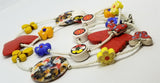 Magnesite Butterflies and Flower Beads on A White Seed Bead Necklace