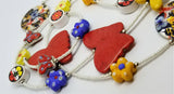 Magnesite Butterflies and Flower Beads on A White Seed Bead Necklace