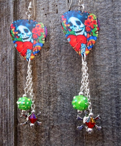 Sugar Skull Surrounded By Flowers Holding a Heart Guitar Pick Earrings with Dangles