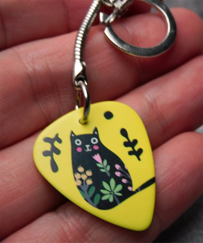 Fat Black Cat with Tilted Head and Flowers on a Yellow Guitar Pick Keychain
