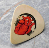 Anatomical Heart with Headphones Guitar Pick Pin or Tie Tack