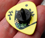 Fat Black Cat and Flowers on a Yellow Guitar Pick Pin or Tie Tack