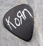Korn White Text On A Black Guitar Pick Lapel Pin or Tie Tack