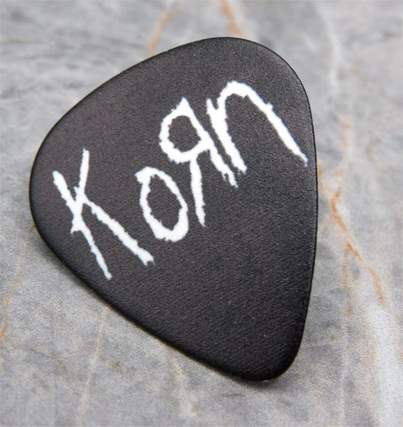 Korn White Text On A Black Guitar Pick Lapel Pin or Tie Tack