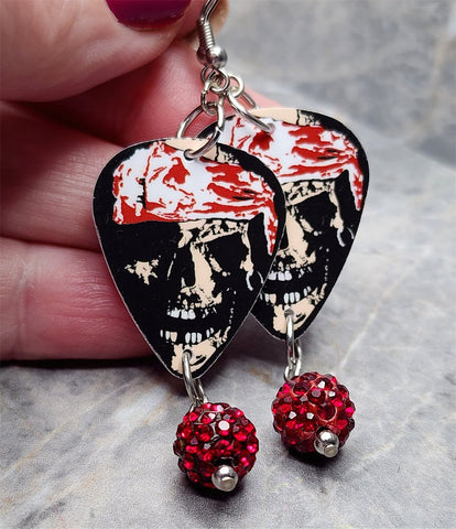 Classic Movie Monsters Skull with Bandages Guitar Pick Earrings with Red Pave Bead Dangles