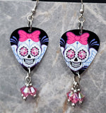 Skull with Wings and a Bow Guitar Pick Earrings with Pink AB Swarovski Crystal Dangles