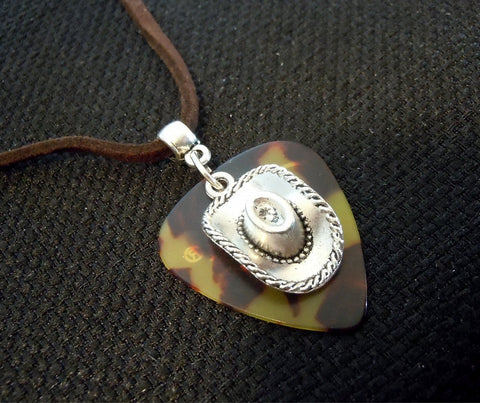 Cowboy Hat on Tortoise Shell Guitar Pick Necklace on Brown Suede Cord