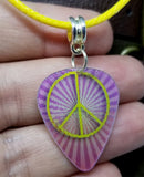 Holographic Peace Sign Guitar Pick Necklace on a Rolled Yellow Cord