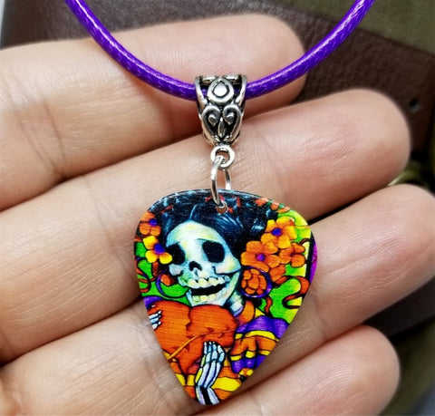 Sugar Skull with a Large Heart Guitar Pick Necklace on a Purple Rolled Cord