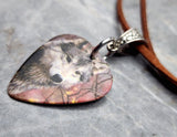 Autumn Wolf Guitar Pick Necklace on Brown Suede Cord