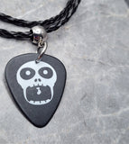 Screaming Skull on a Black Guitar Pick Necklace with Black Braided Cord