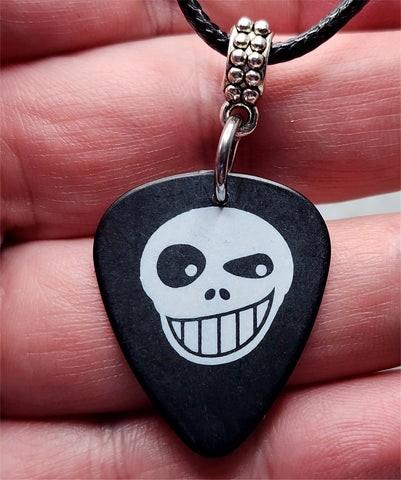 Winking Skull Guitar Pick Necklace with Black Rolled Cord