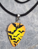 Swarm of Bats Orange Guitar Pick Necklace with Black Suede Cord