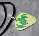 Korn Green Guitar Pick Necklace with Black Sueded Cord