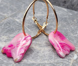 Shimmering and Marbled Pink Polymer Clay Ghost Earrings on Light Gold Hoops