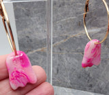 Shimmering and Marbled Pink Polymer Clay Ghost Earrings on Light Gold Hoops