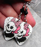 Skull with a Pink with Black Polka Dots Bow Guitar Pick Earrings with Black Swarovski Crystals