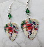 Santa Making Snowmen Scene Guitar Pick Earrings with Emerald Green Swarovski Crystals