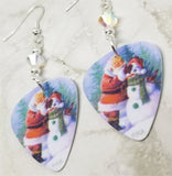 Santa Making a Snowman Scene Guitar Pick Earrings with Clear ABx2 Swarovski Crystals