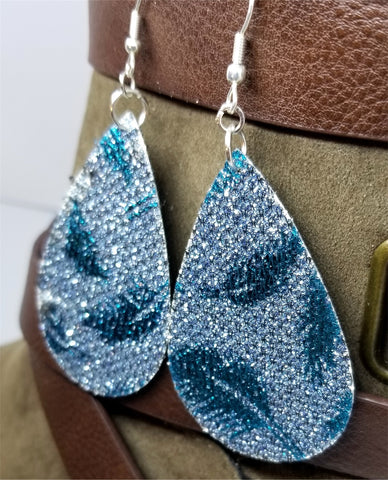 Silver Glittering FAUX Leather Teardrop Earrings with Blue Metallic Feathers Printed On Them