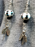 White with Blue and Black Polka Dots Lampwork Glass Rondelle Bead with Feather Charm Dangles