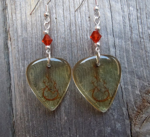 Transparent Scrolling Guitar Graphic Guitar Pick Earrings with Indian Red Crystals