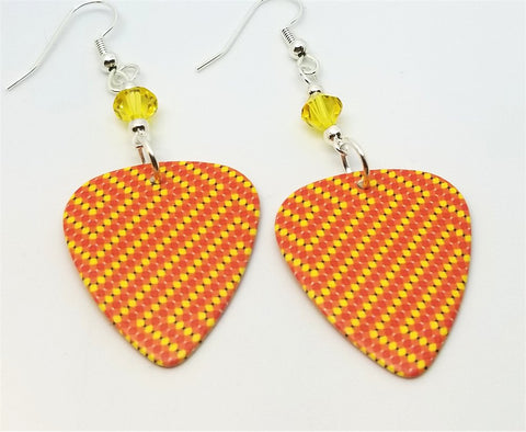 Orange Guitar Pick Earrings with a Yellow Dot Line Pattern and a Yellow Swarovski Crystal