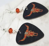 Southwestern Decorative Cow Skull Guitar Pick Earrings with Indian Red Swarovski Crystals