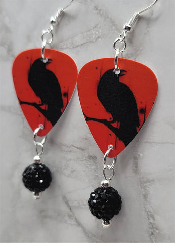 Raven on a Red Background Guitar Pick Earrings with Black Pave Bead Dangles