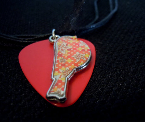 Orange Flowered Bird Charm with a Red Guitar Pick on a Black Ribbon Necklace
