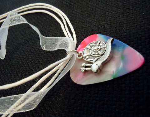 Snail Charm on a MultiColor Guitar Pick With a White Ribbon Necklace