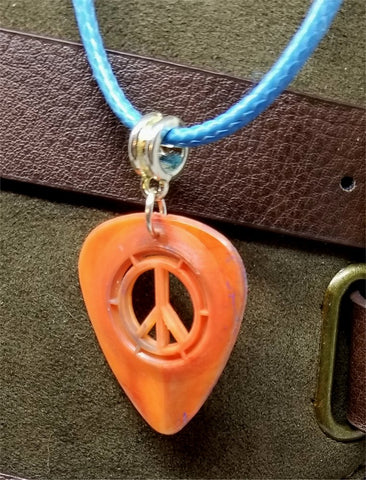 Peace Sign Cut Out Orange Guitar Pick with Aqua Blue Rolled Cord Necklace