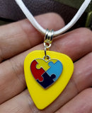 Autism Awareness Heart Charm on Yellow Guitar Pick Necklace on White Suede Cord