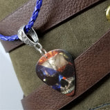 Flag of Puerto Rico Over Skull Guitar Pick Necklace on Blue Braided Leather Cord