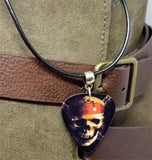 Skull Guitar Pick Necklace on a Black Rolled Cord