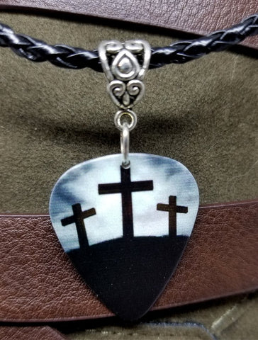 Three Crosses Guitar Pick Necklace with Black Braided Cord