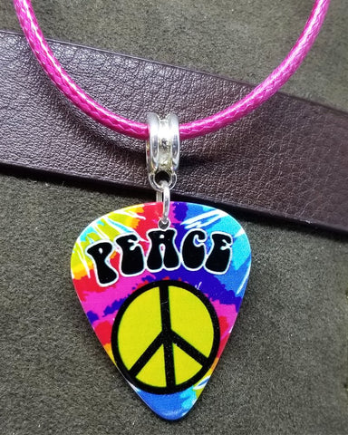 Tie Dye Peace Sign Guitar Pick on a Hot Pink Rolled Cord Necklace