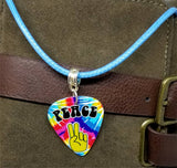 Tie Dye Peace Sign Fingers Guitar Pick on a Blue Rolled Cord Necklace