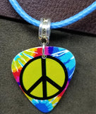 Tie Dye Peace Sign Guitar Pick on a Blue Rolled Cord Necklace