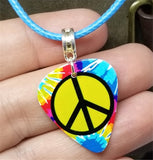 Tie Dye Peace Sign Guitar Pick on a Blue Rolled Cord Necklace