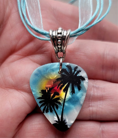 Palm Tree Guitar Pick Necklace on a Blue Ribbon Cord