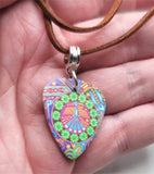 Funky Peace Sign Guitar Pick Necklace on a Brown Suede Cord